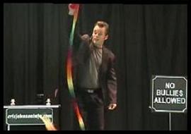 School Assembly Presenter Cris Johnson performing a magic trick