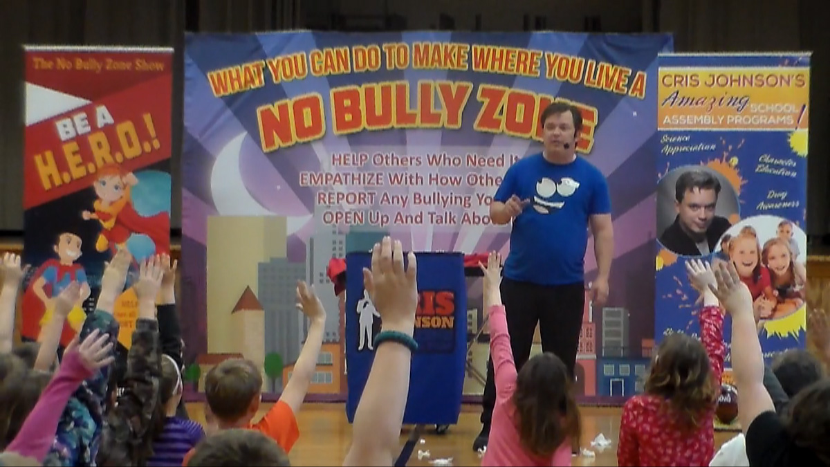school assembly presenter Cris Johnson at a bully prevention show