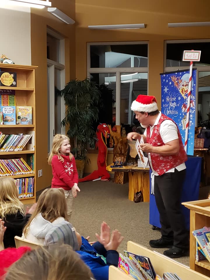 School assembly performer Cris Johnson at a Christmas magic show